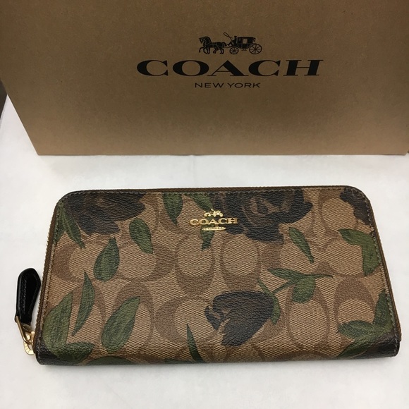 Coach Handbags - Authentic Coach Camo Rose full size wallet 🖤